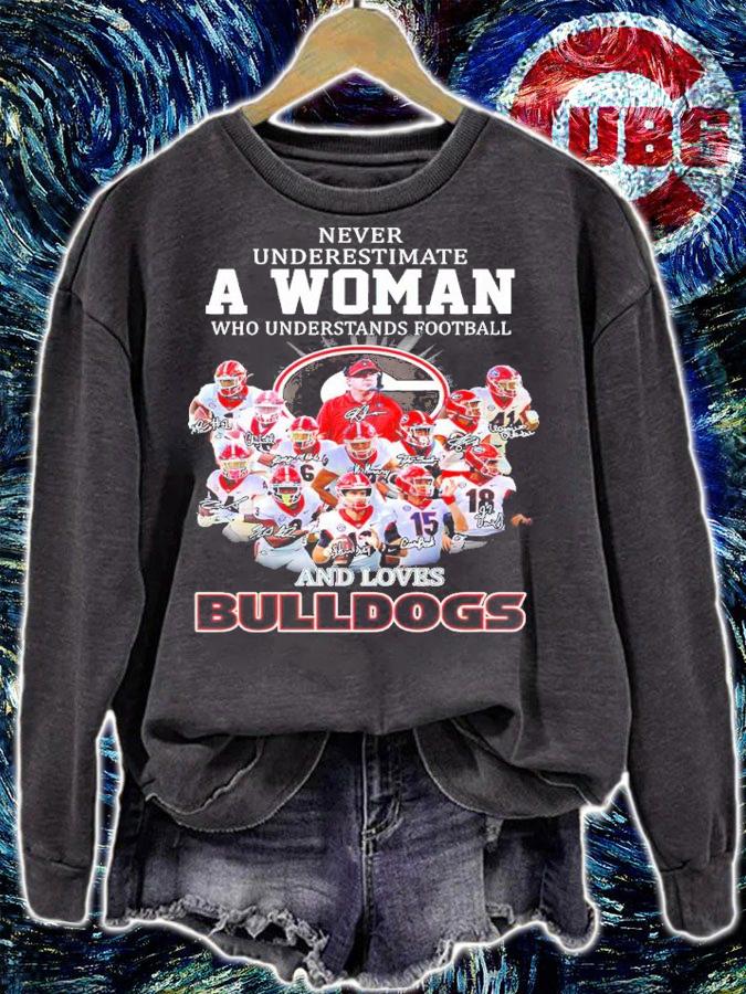Never underestimate a woman who understands football and loves Georgia Bulldogs signatures shirt sweatshirt
